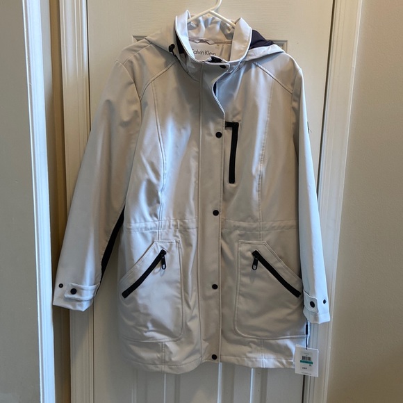 Calvin Klein Jackets & Blazers - NWT Calvin Klein jacket. Zipper and snap closure, water resistant